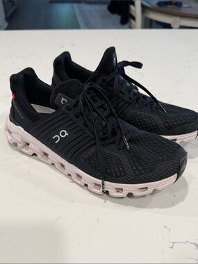 On Cloud Women’s Running Sneakers in Black with White Sole